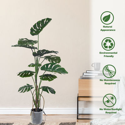 Piante conservate in vaso artificiali del pavimento dell'albero falso di Monstera per la decorazione domestica